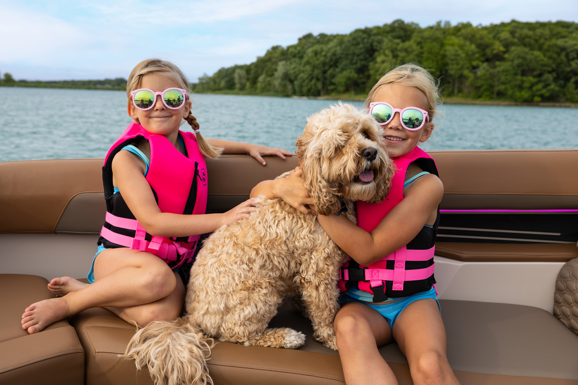 Children on a Harris Pontoon enjoying a day on the water